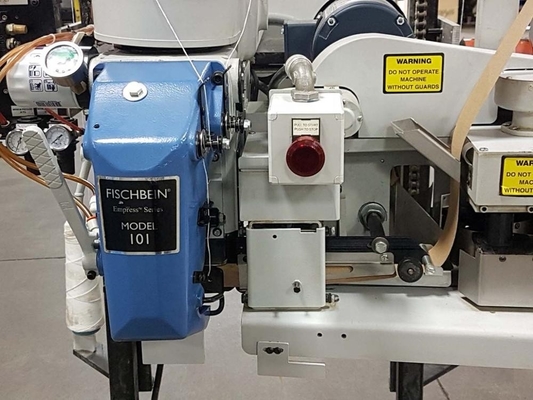 Macchina di cucire Fischbein per chiusura semiautomatica di sacchetti